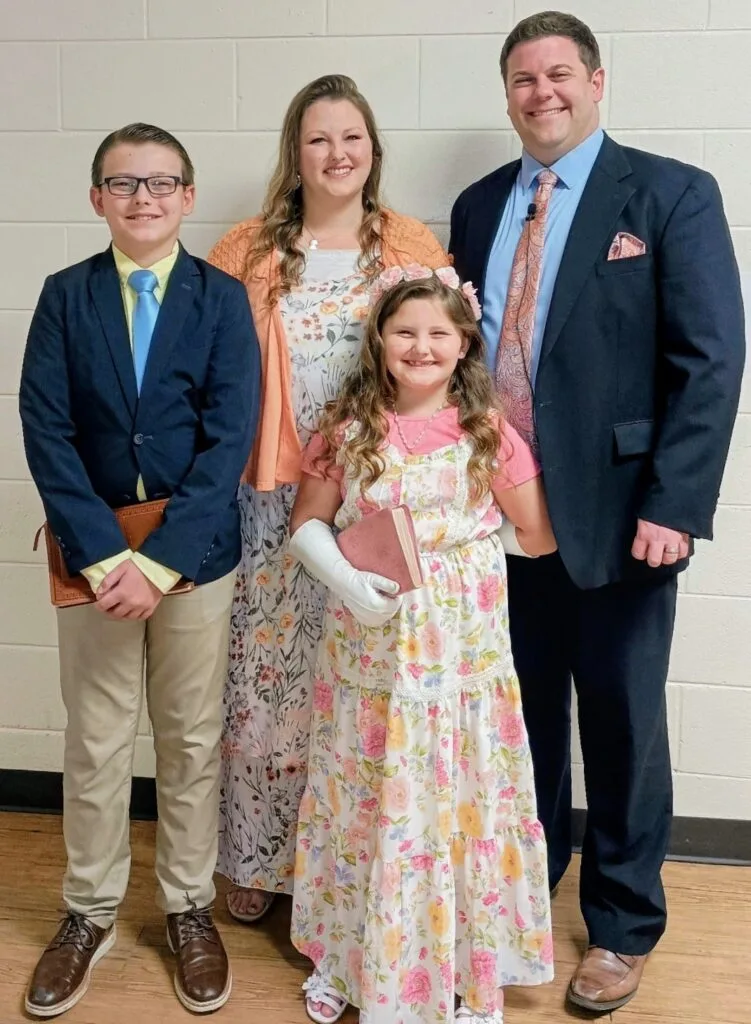 Pastor Chris Reynolds with his wife Courtney and their children